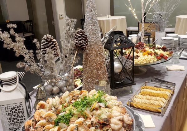 Chilled shrimp and cheese display showing full-service holiday catering